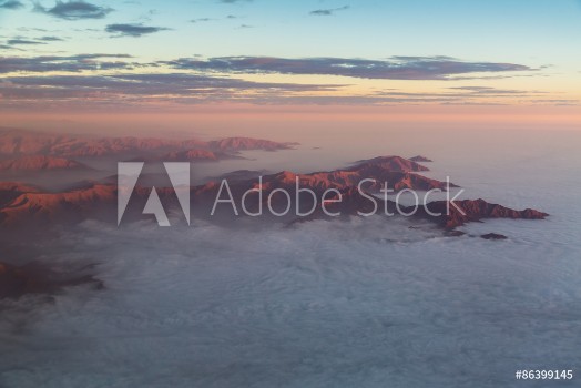 Picture of The Andes mountains rising out of a stratus cloudlayer